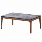 Table basse, rectangulaire 120 cm, plateau en pierre reconstituée grise, piètement en bois de noyer marron