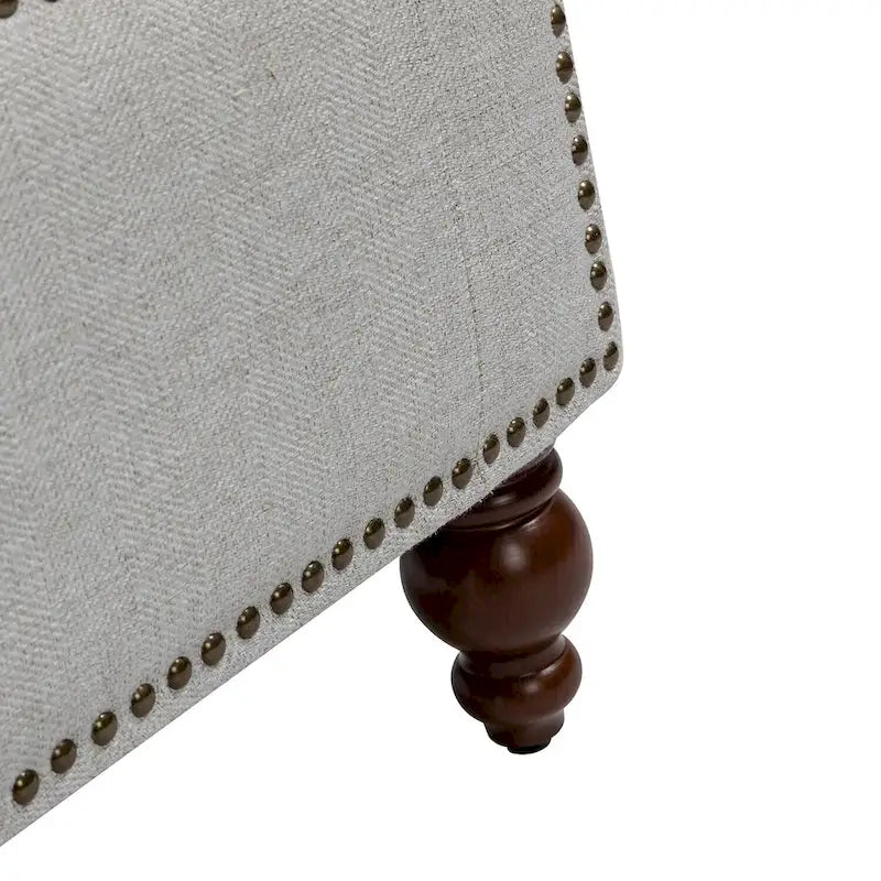 Banc de rangement capitonné classique avec garnitures cloutées