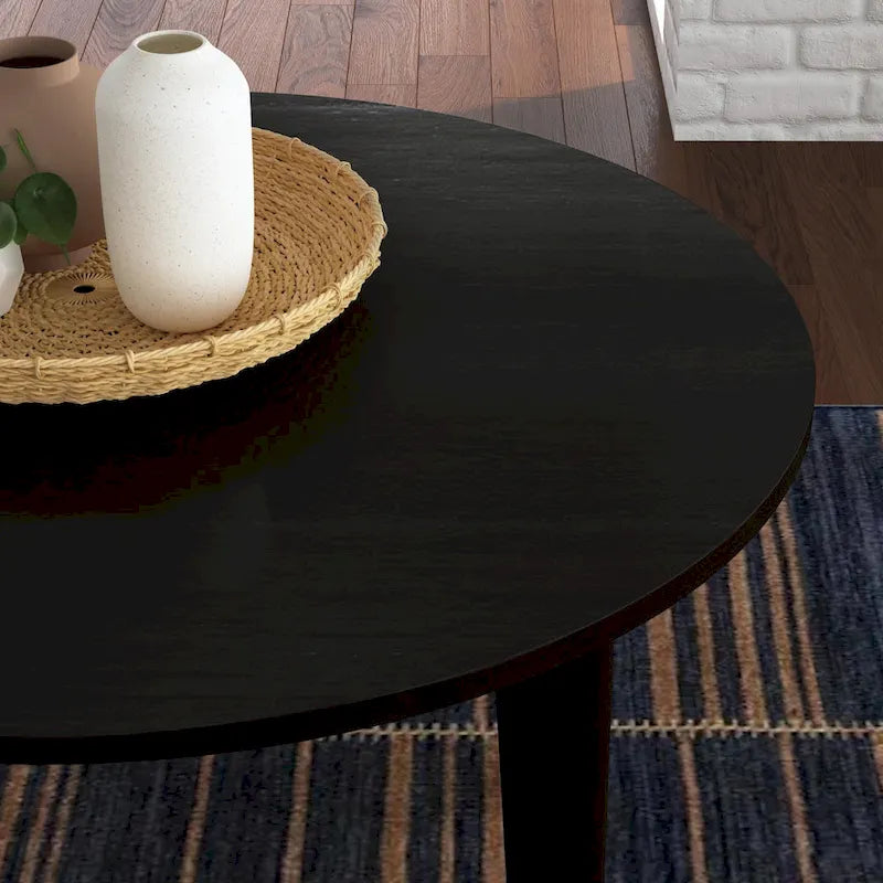 Table à manger ronde en bois noir
