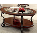 Table basse avec plateau en verre de 122 cm et fer forgé.