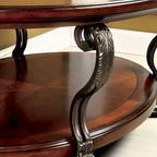 Table basse avec plateau en verre de 122 cm et fer forgé.