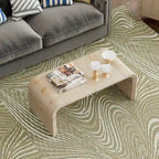 Table basse au design incurvé et à la finition en bois